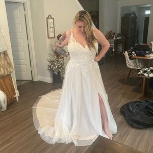 Brand new wedding dress never worn.